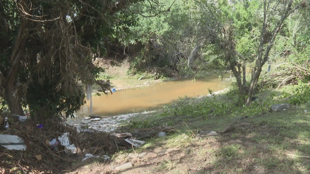 Kerrville couple rescued as creek flooding traps them in their home.